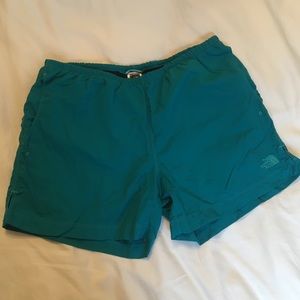 The North Face teal women’s athletic shorts